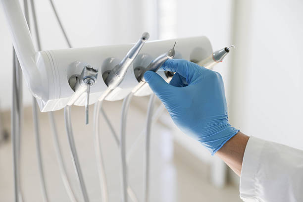 Professional Tooth Extraction technician working in Pink, OK